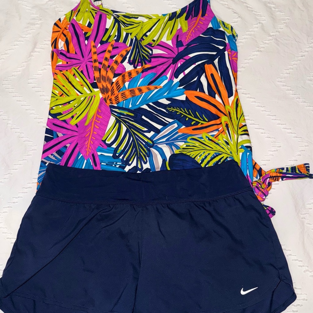 Coco Reef Tropical Print swimsuit top and Dark Blue nike swimsuit bottoms.